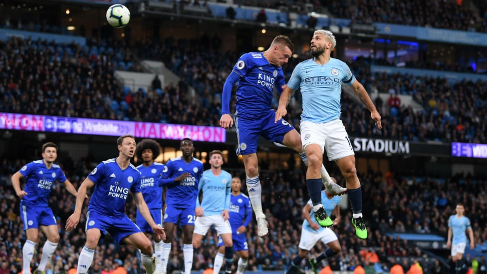 CLOSE : Sergio Aguero sees his header pushed onto the bar by Schmeichel.