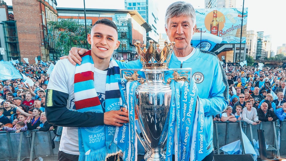 LANDMARK MOMENT : Celebrating at the Champions parade after City completed a  clean sweep of domestic trophies.