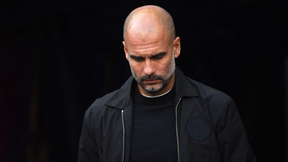 THE BOSS : Pep looks pensive prior to kick off