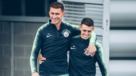 TEAM MATES: Aymeric Laporte and Phil Foden.