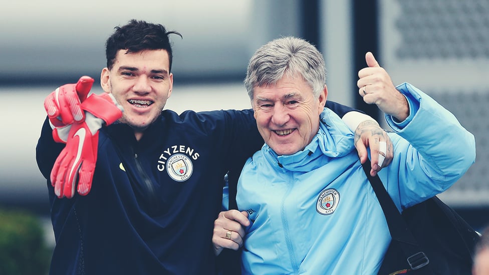 THUMBS UP : Ederson and assistant coach Brian Kidd are all smiles