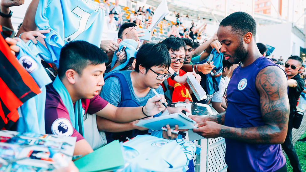 SIGNED AND SEALED : It's Raheem Sterling's turn to sign autographs