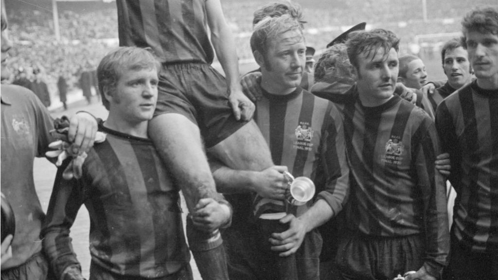 TRUE BLUES : Glyn Pardoe (second right) and Mike Doyle (far right) celebrate our 1970 League Cup final triumph