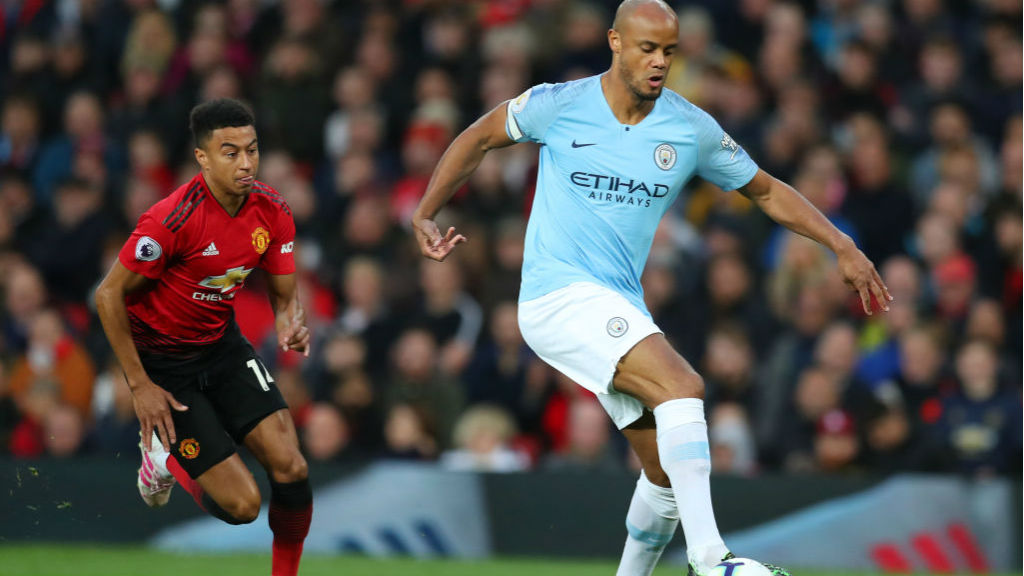 LEADING MAN : Skipper Vincent Kompany gets an early touch on the ball