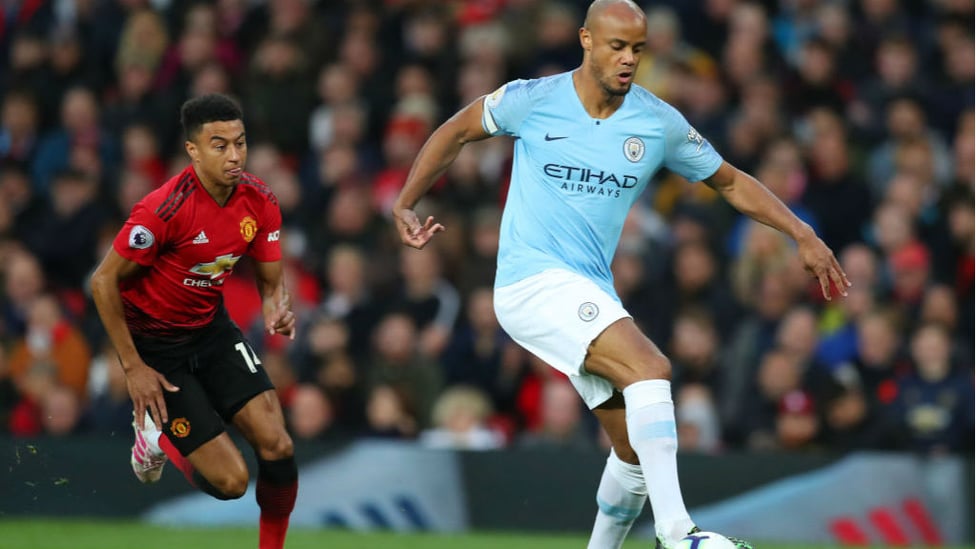 LEADING MAN : Skipper Vincent Kompany gets an early touch on the ball