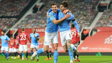 BREAKTHROUGH: John Stones and Ruben Dias celebrate the former's opening goal