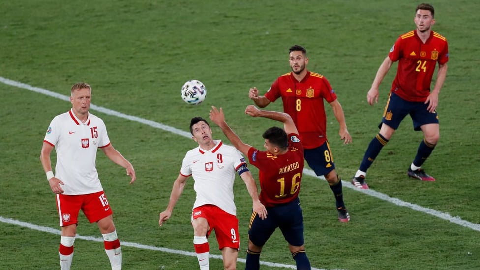 IN THE THICK OF THINGS : Laporte and Rodri started as Spain drew their second match 1-1 with Poland.