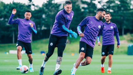 QUICK GET AWAY: The chase is on between Ederson and Riyad Mahrez!