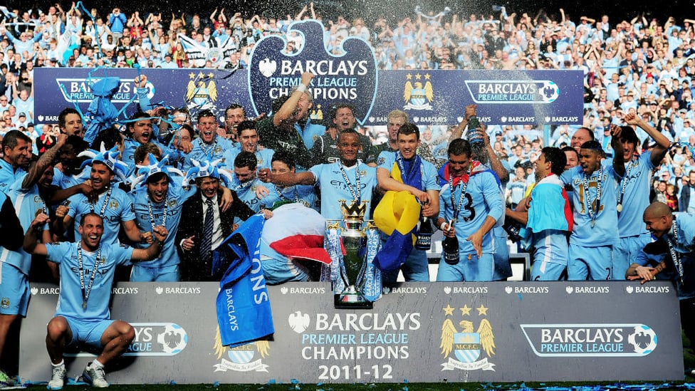 SPOT SILVA : Can you see our Spanish midfielder after we won the 2011/12 Premier League, a clue - he is sporting some fancy headgear.