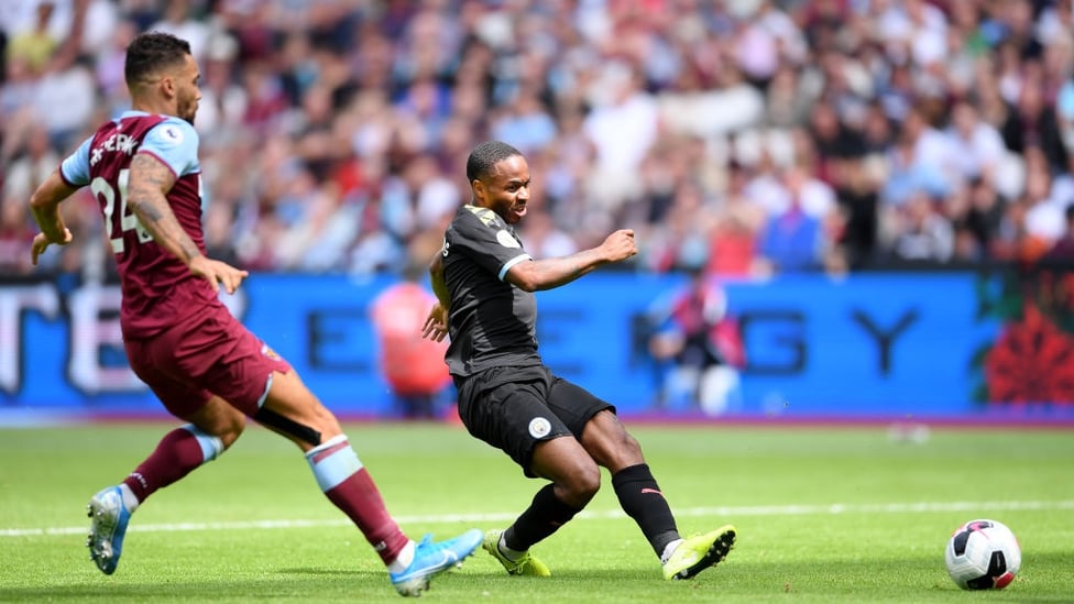 CLINICAL : Raheem Sterling opens his Premier League account with a left-footed finish.