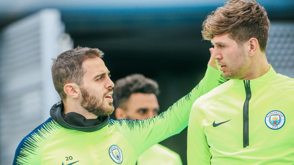 TWO BLUES, ONE STONES : Bernardo gives his teammate a pat on the back!