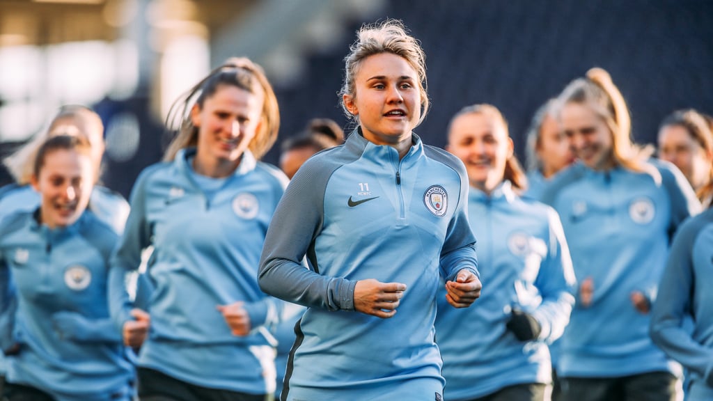 OFF WE GO: The team set off for a jog around the pitch