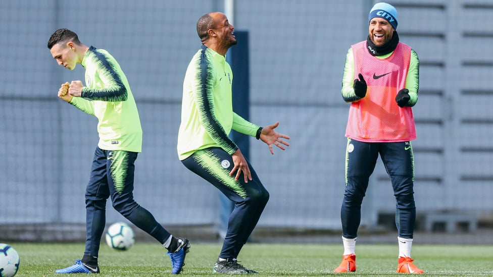 DEFENSIVE PARTNERS : Vincent Kompany and Nicolas Otamendi share a joke