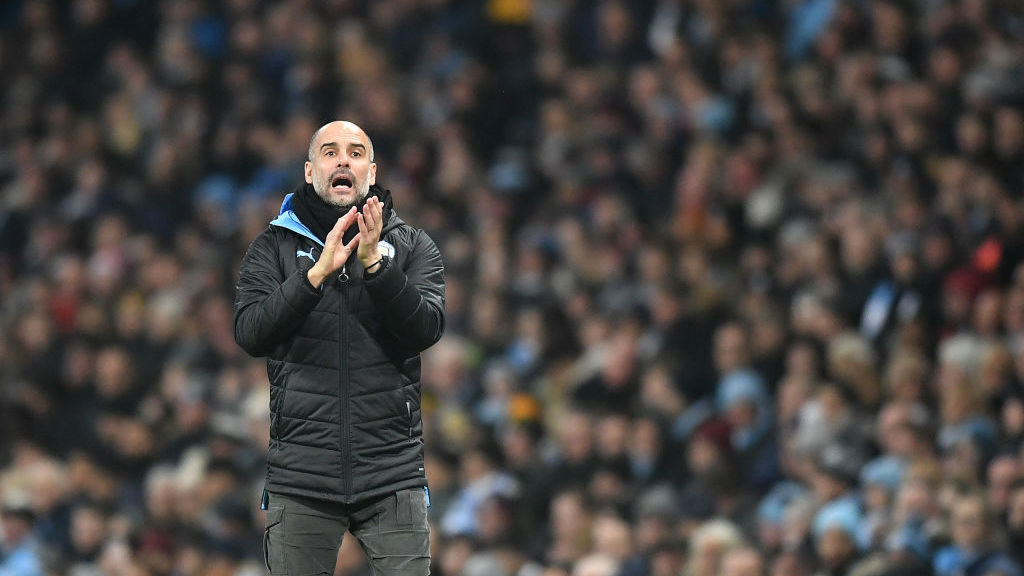 THE BOSS : Guardiola shouts his instructions from the touchline