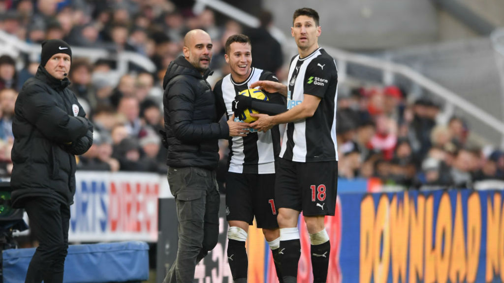 THE BOSS : Pep shares a joke with the opposition