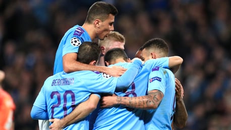 BLUES BROTHERS: The team gather to congratulate Ilkay Gundogan