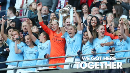 UP FOR THE CUP: Skipper Steph Houghton hoists the FA Cup aloft