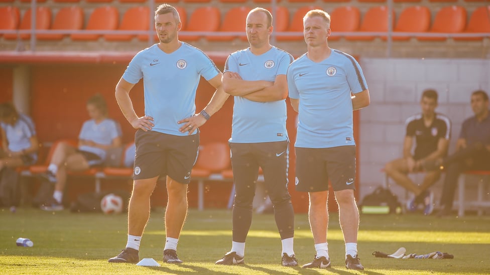 COACHING STAFF : Nick and his staff look on ahead of the match.