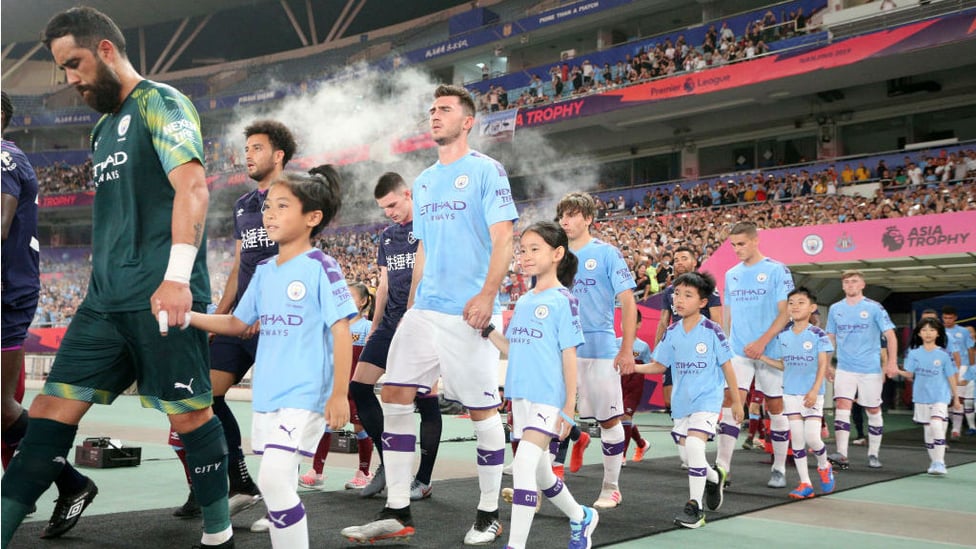 CALL OF DUTY : The City team stride out ahead of kick-off in Nanjing