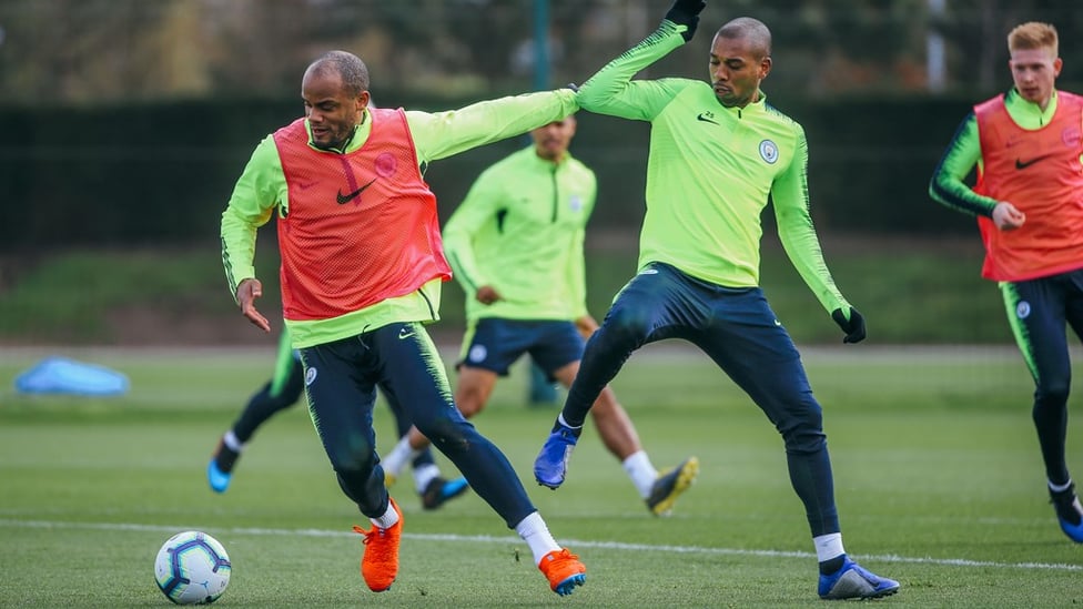 BATTLING BELGIAN : Vincent Kompany evades the close attention of Fernandinho