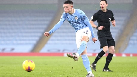 GUNNING FOR TWO: Foden blasts towards goal mid-way through the second period.