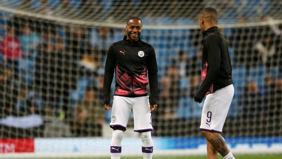 KEEPING WARM : Raheem Sterling and Gabriel Jesus start tonight's match on the bench