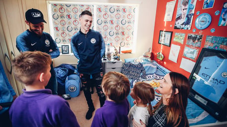 XMAS SURPRISE: David Silva and Phil Foden gave the Clark's a wonderful surprise 