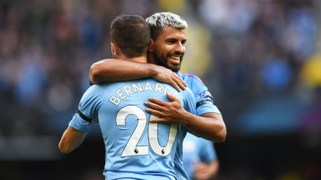 IN SYNC: Bernardo Silva and Sergio Aguero celebrate the former's late strike.