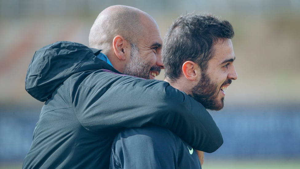 SMILES ALL ROUND : Pep Guardiola and Bernardo Silva share a laugh