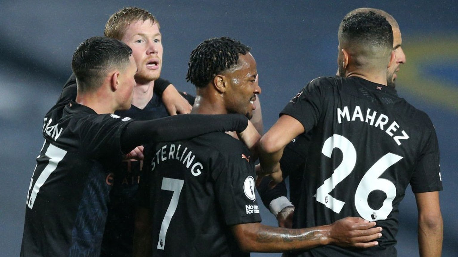 BRIGHT START: The lads congratulate Raheem after he opens the scoring