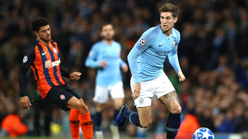 ROLLING STONES : City and England defender John Stones shepherd's the ball to safety