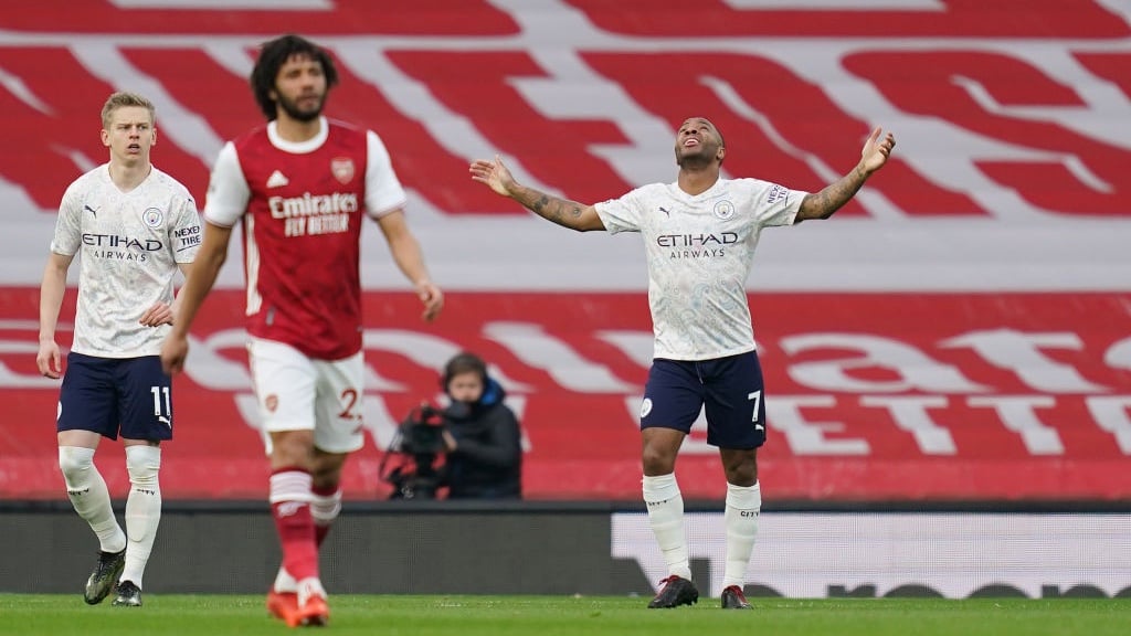 PRAYERS ANSWERED: Sterling celebrates his goal at the Emirates.