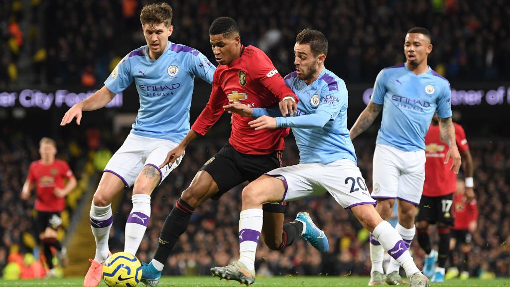 TANGLE : Bernardo makes the challenge which handed United a penalty.