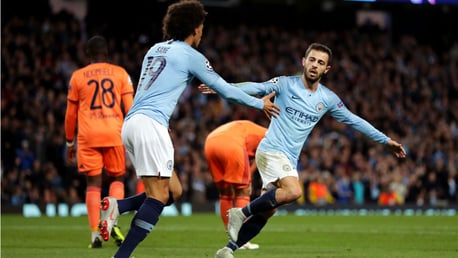 GAME ON: Bernardo Silva celebrates his goal with Leroy Sane