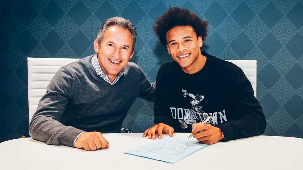 ALL SMILES: Leroy Sane is welcomed to City by director of football Txiki Begiristain