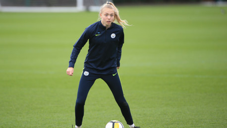 DEFENSIVE STEEL: Esme Morgan takes the ball in training.