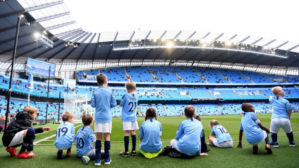 READY AND WAITING : Today's mascots prepare for the game