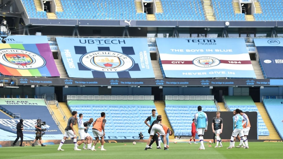 GROUP SESH : The starting team stretch their muscles together as final preparations for the match begin.