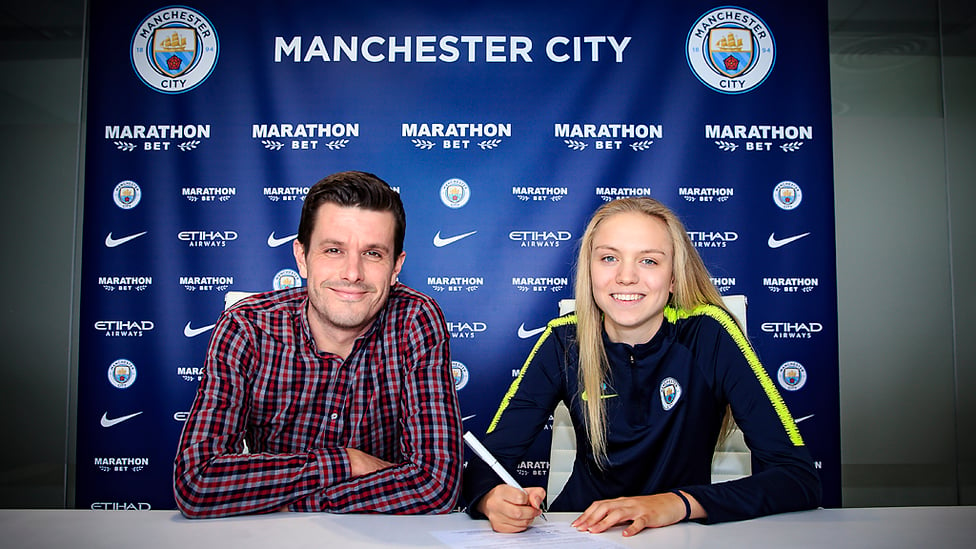 Pen to paper with Head of Women's Football Gavin Makel