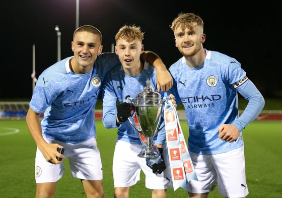 Harwood-Bellis with Cole Palmer and Tommy Doyle after Manchester City's FA Youth Cup win 2020