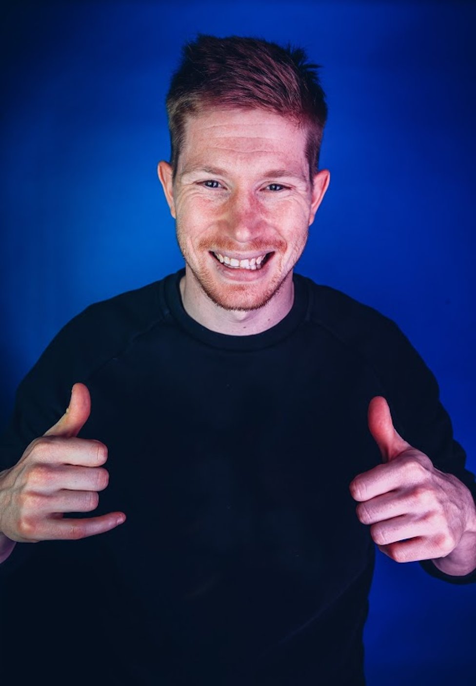 THUMBS UP: De Bruyne had every reason to celebrate having helped City to regain the Premier League title and retain the Carabao Cup