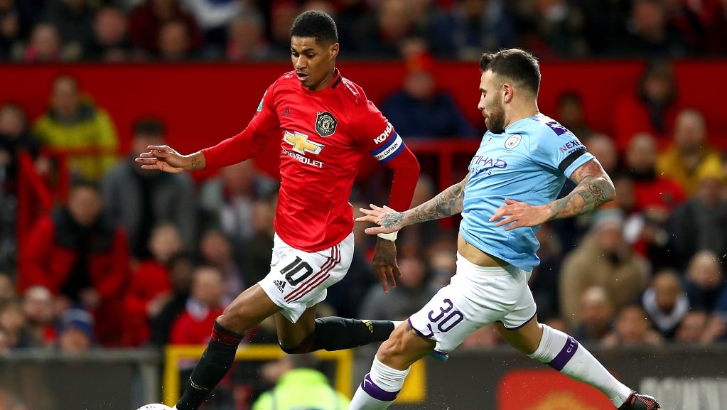 EARLY THREAT: Nicolas Otamendi keeps Marcus Rashford under watch