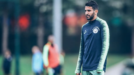 MAGIC MAHREZ: Riyad keeps his hands warm on a chilly day in Manchester 