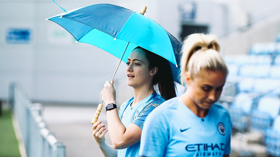 SINGING IN THE RAIN : Megan Campbell.