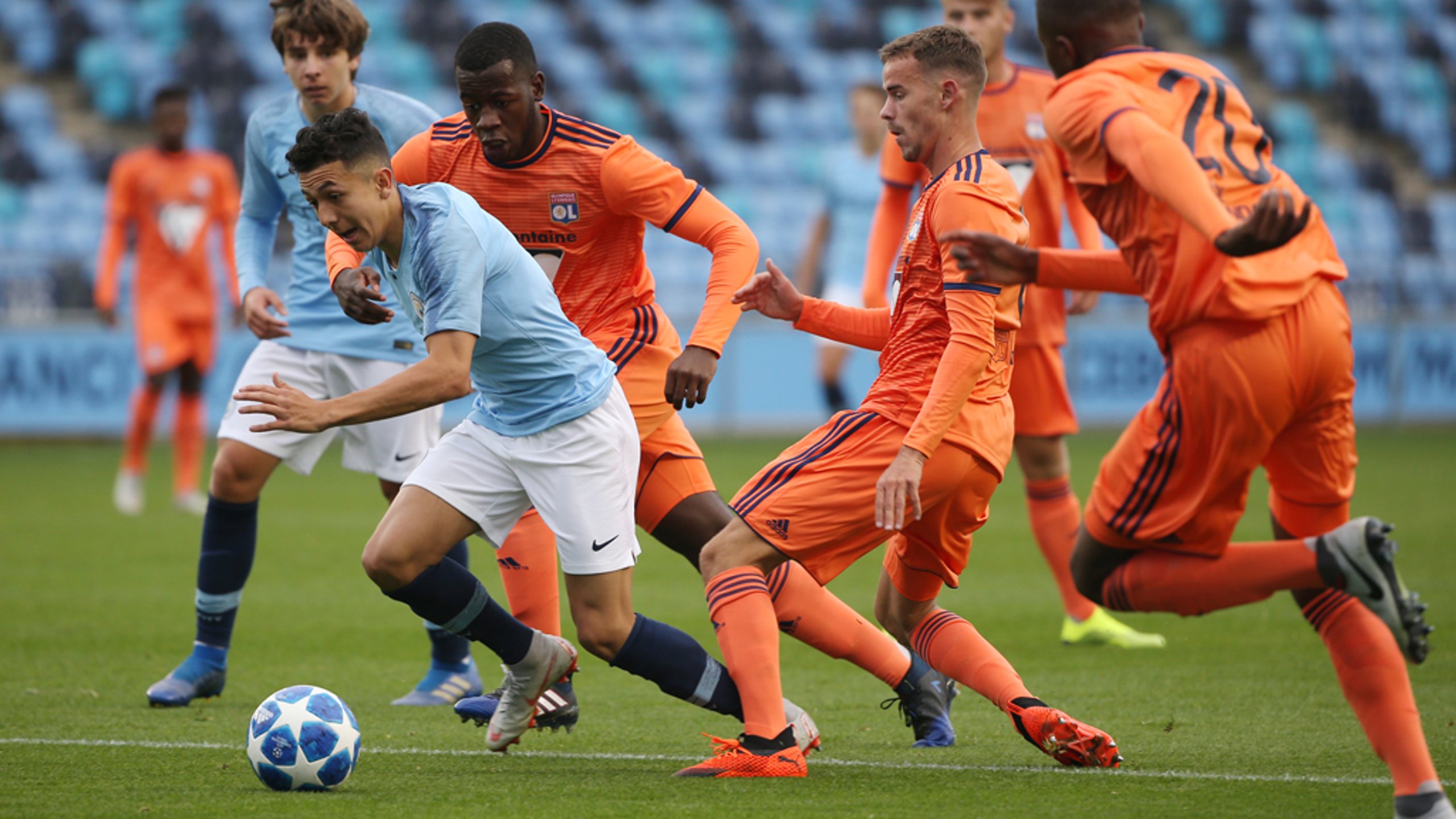 ACTION SHOT: Ian Poveda bursts through the Lyon defence.