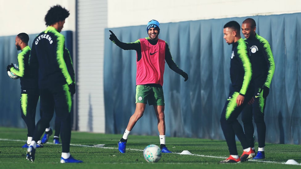 CENTRE OF ATTENTION : Riyad Mahrez hands out some training pointers