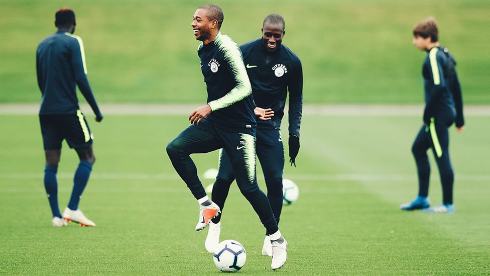 STEP TO IT : Fernandinho and Benjamin Mendy share a smile