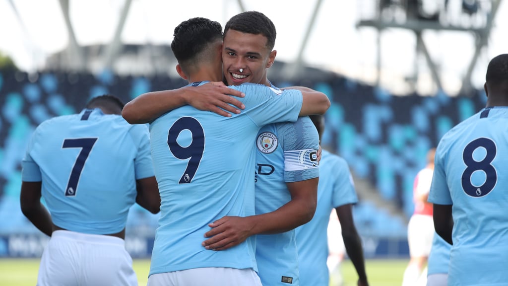 ELATION: City celebrate victory over Arsenal