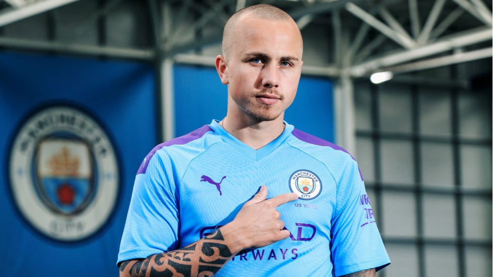 BADGE OF HONOUR : Angelino celebrates after sealing his return to City earlier this week