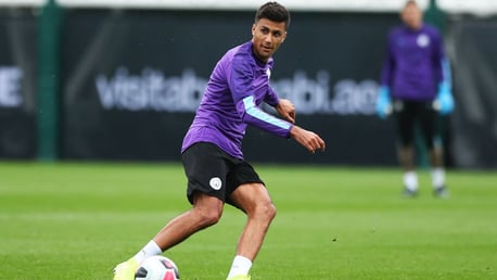 ON THE MOVE: Rodri takes the ball in training.